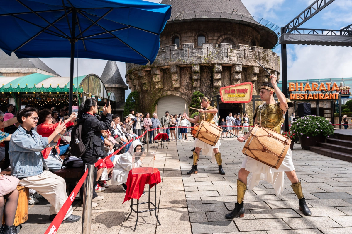Solar Warrior outdoor performance at Ba Na Hills Spring 2026 with dancers and live drums.